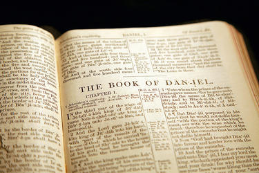 Bible opened to the book of Daniel.