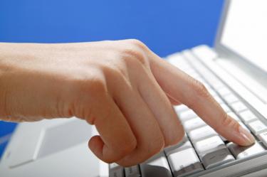 Finger pressing delete on computer - If I Knew Then What I Know Now