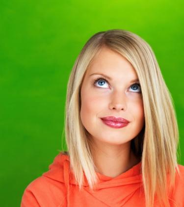 Woman looking up thinking - Understanding God