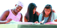 A group of teens studying together.