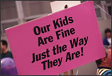 Poster reads: Our kids are fine just the way they are!