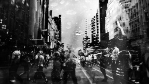 Crowds of people walking a street.