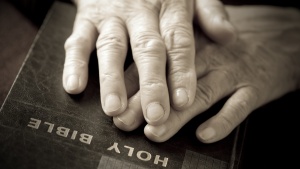 Hand on a Bible