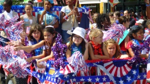 Girls on a parade float.