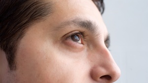 A close up of a man's face.