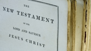 A Bible opened to beginning of the New Testament.