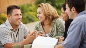 A group of people talking.