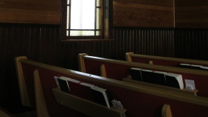 Pews inside a church.