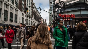 People walking in a busy city.