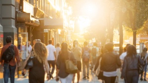 People walking on a sidewalk. 