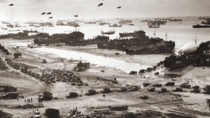 With the Normandy beachhead secured, vast numbers of Allied troops and military vehicles flood ashore.
