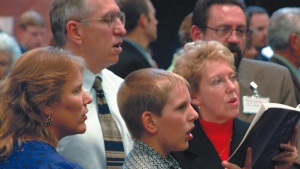 People singing during church service.