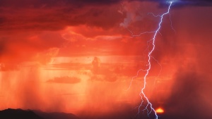 A storm with clouds, rain and lightning. 