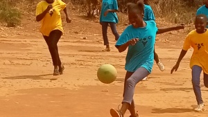 a group of girls playing sports outside