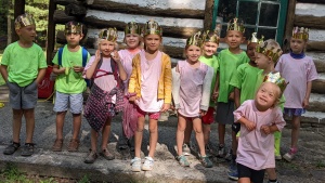 a group of children wearing crowns