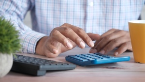 a man using a calculator