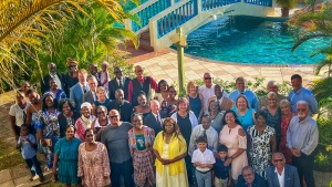 a group of people seen from above with a resort background