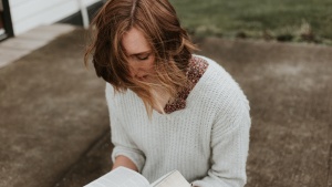 A woman reading her Bible.
