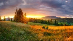 A sunset over a mountain ridge.