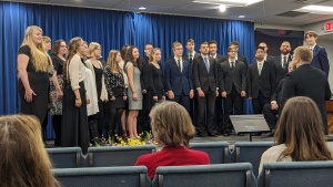 a choir standing onstage