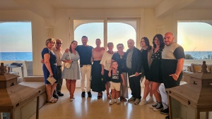 a group of people standing indoors