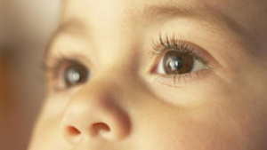 A child's eyes up close.