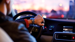 A man driving a car.