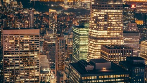 City buildings lit up a night.