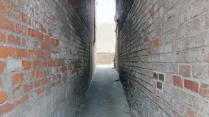 narrow path between two buildings