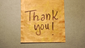 Thank you! written on brown paper.