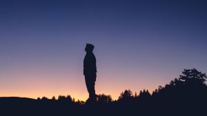 A man looking up at the stars.