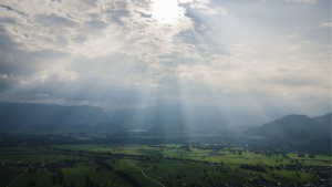 Sun rays coming through the clouds.