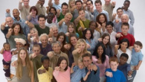 A group of people pointing at the camera.