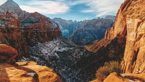 a mountainous landscape filled with red rock structures