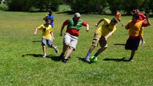 Campers at Camp Woodmen play a game of speedaway. 