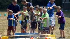 Campers and staff enjoying fun activities at Northwest Preteen Camp. 
