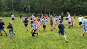 Campers playing a game at preteen camp Seven Muontains. 