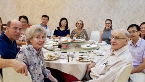 Feastgoers at dinner in Penang, Malaysia.