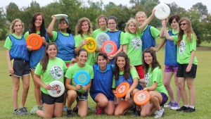 Girls dorm taking part in the frisbee activity at Camp Woodman. 