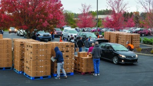More than 60 people volunteered to assist directing traffic, loading cars and restocking boxes.