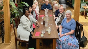 a group of people seated at a table