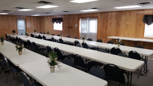  The hall is set up for a potluck. 