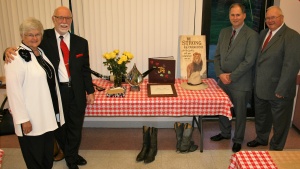 The McCradys (on the left) with Ron Barker and Dave Hemsley (on the right) who presented the gifts to the McCradys.