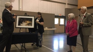 Randy and Penny Urwiller present a gift on behalf of the congregation to Don and Wanda Ward.