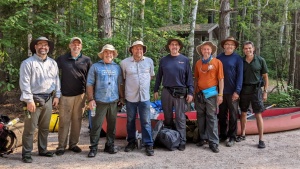 Chris Rowland, Paul Moody, Mark Welch, Michael Fike, Doug Wendt, Jeff Lockhart, Skeets Mez and Frank Dunkle after completing their adventure in the Boundary Waters Canoe Area Wilderness of Minnesota.