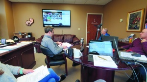 Ariana Del Signore, Dan Preston, Jorge de Campos, Mark Welch and Chris Rowland (right; not pictured) gather in  Victor Kubik's office for the festival planning meeting which was conducted with about 35 other people over WebEx.