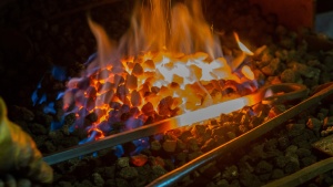 Photo of blacksmith and hot coals