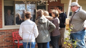 Photo of ABC students singing for Diane Bailey.