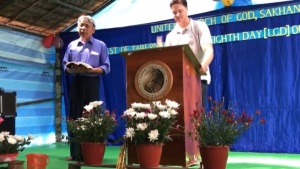 Aaron Jennings gives a message while keeping the Feast in Myanmar.