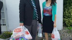 Ben Shoemaker and Chelsea Shaw with items they collected for the Women’s Crisis center in Maysville, Kentucky.
